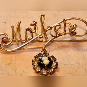 Gold 'Mother' Brooch with Floral Accent